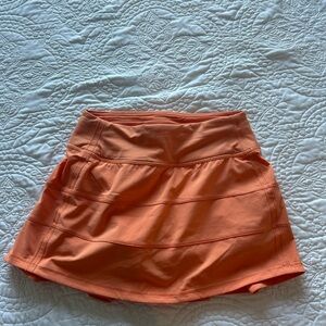 Orange Lululemon tennis skirt. Size 0